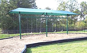 a swing set shade for a playground